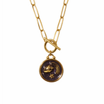 Gold plated necklace with a circular pendant with resin in the center