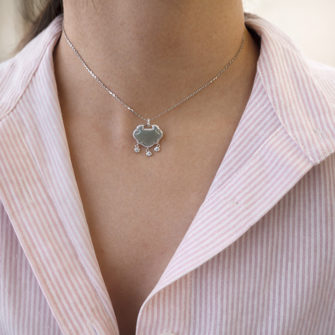sterling silver with a cloud shaped necklace with a pendant