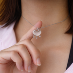 sterling silver necklace with a cloud shaped pendant 