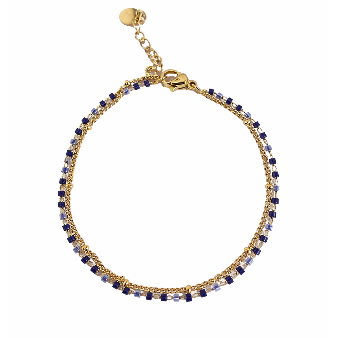 gold plated bracelet with blue and white beads 