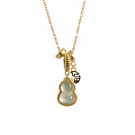 gold plated necklace with a gourd shaped pendant