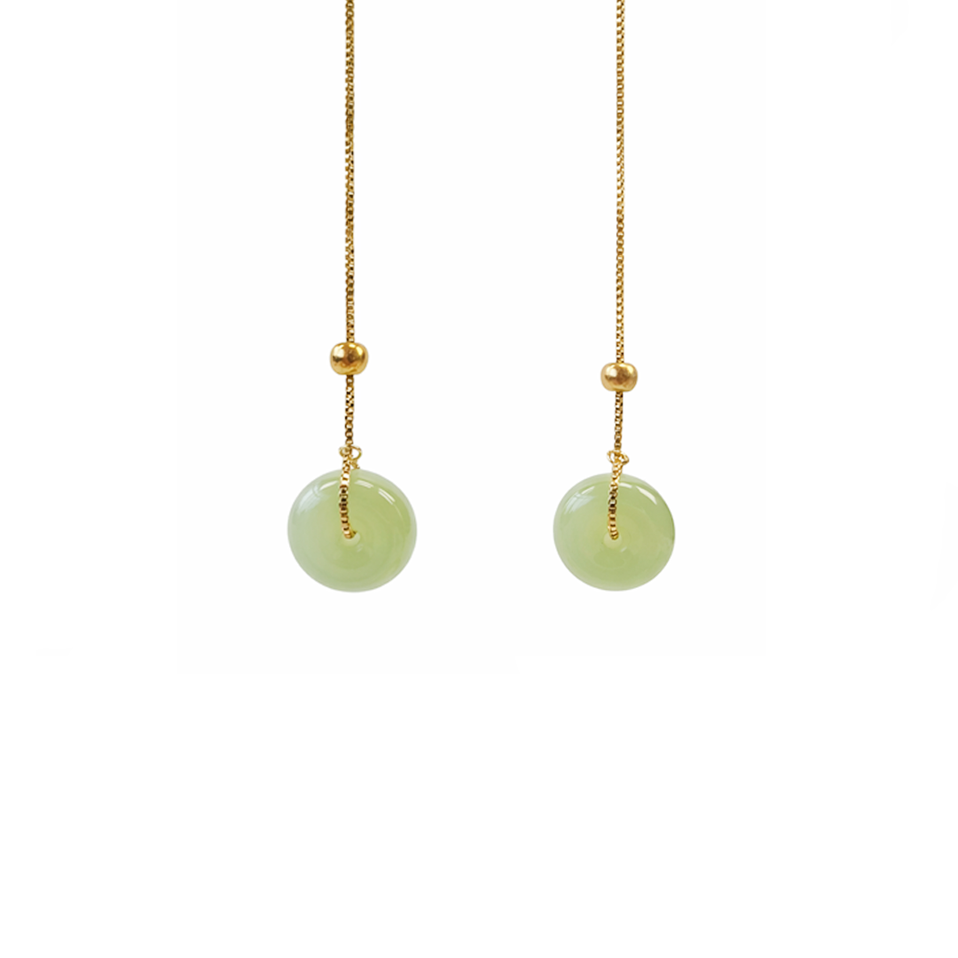 Halo is pair of green jade earrings with gold plated sterling silver chain