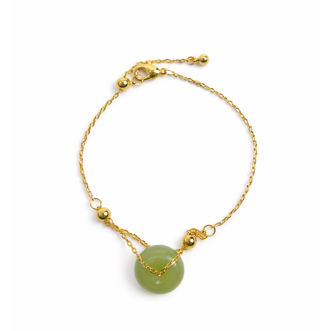 Halo sterling silver and gold plated bracelet with green jade gemstone