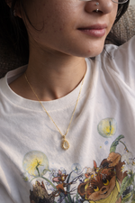 Imperial Ivory Drop 垂华 (Chuí Huá) a gold necklace with a teardrop pendant
