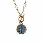 Necklace with a Libra zodiac sign pendant 