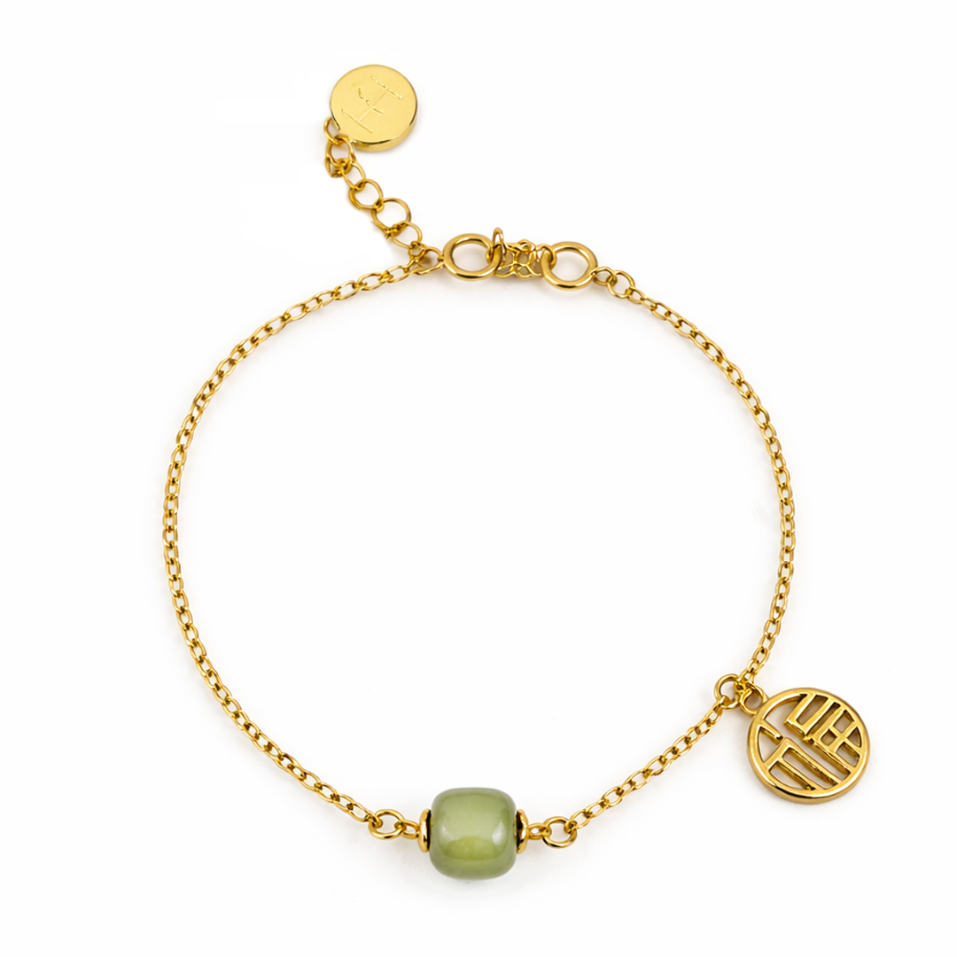 green bead sterling silver gold plated bracelet with charm