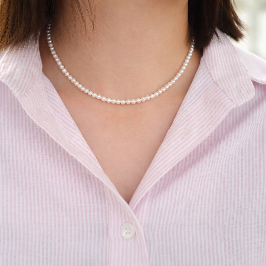 5mm lumina pearl necklace worn by a person 
