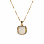 Lunar legacy gold plated sterling necklace with a square pendant featuring a white jade stone 