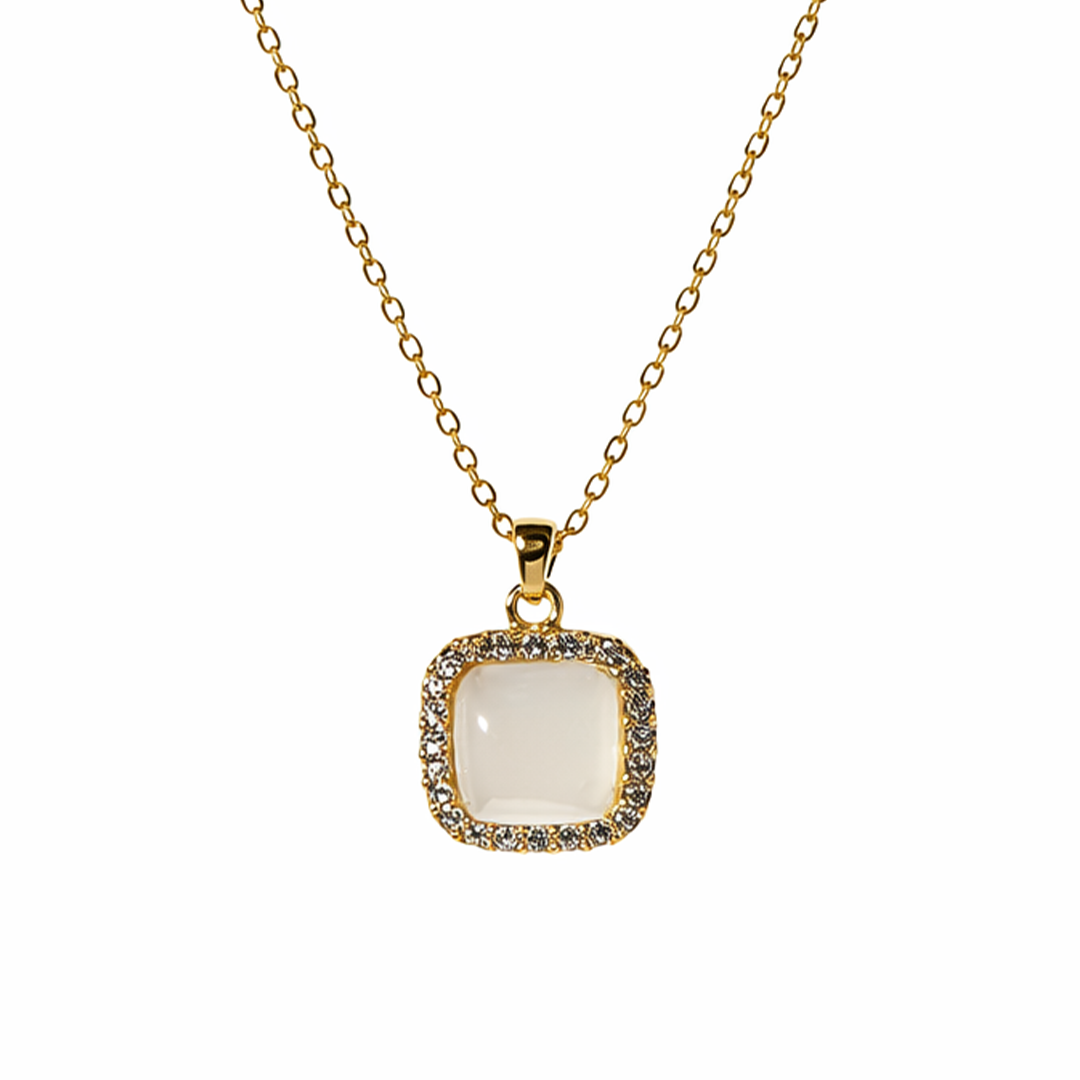 Lunar legacy gold plated sterling necklace with a square pendant featuring a white jade stone 