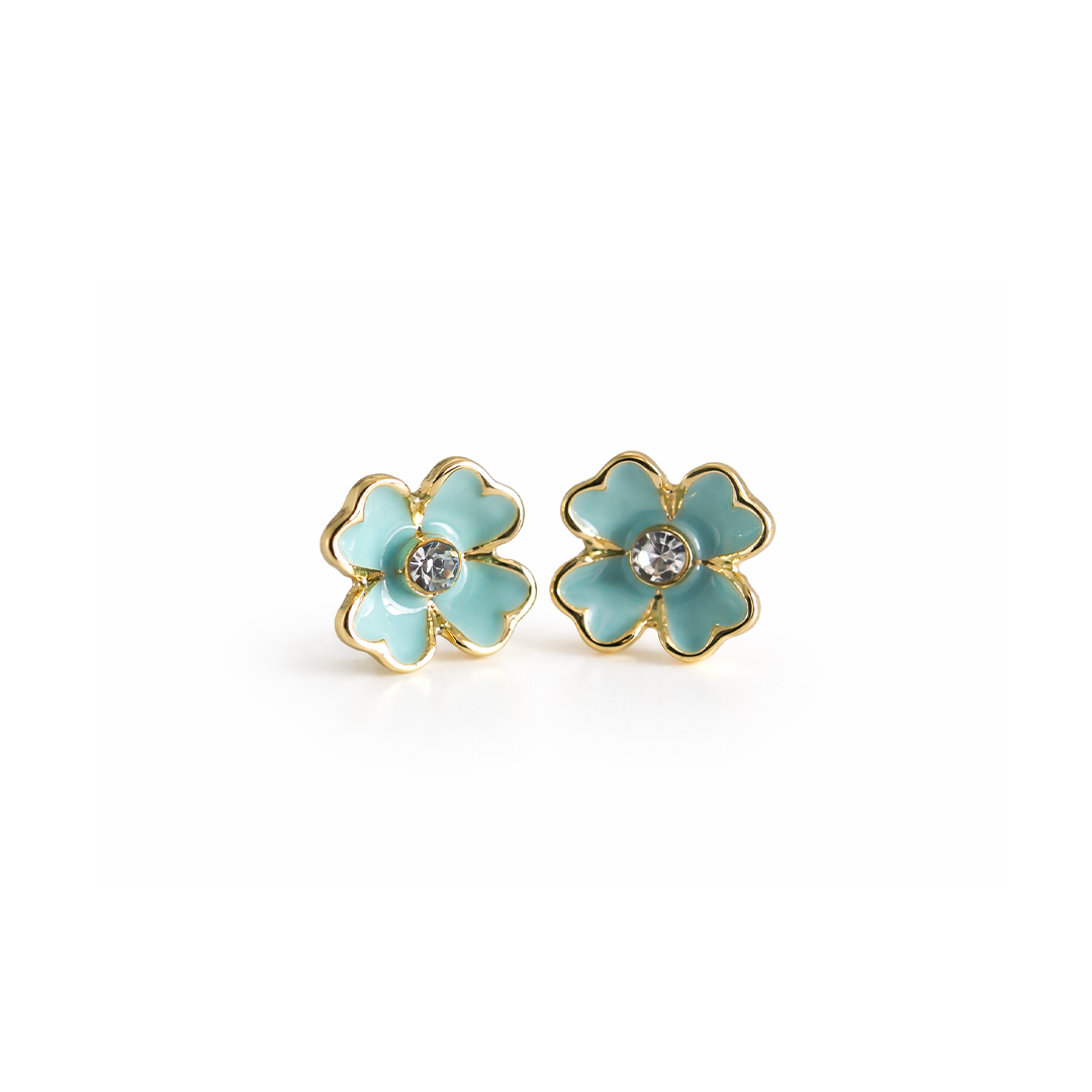 Pair of light turquoise flower shaped earrings with gold plated accents 
