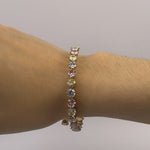 bracelet that has white,yellow and light pink gemstone