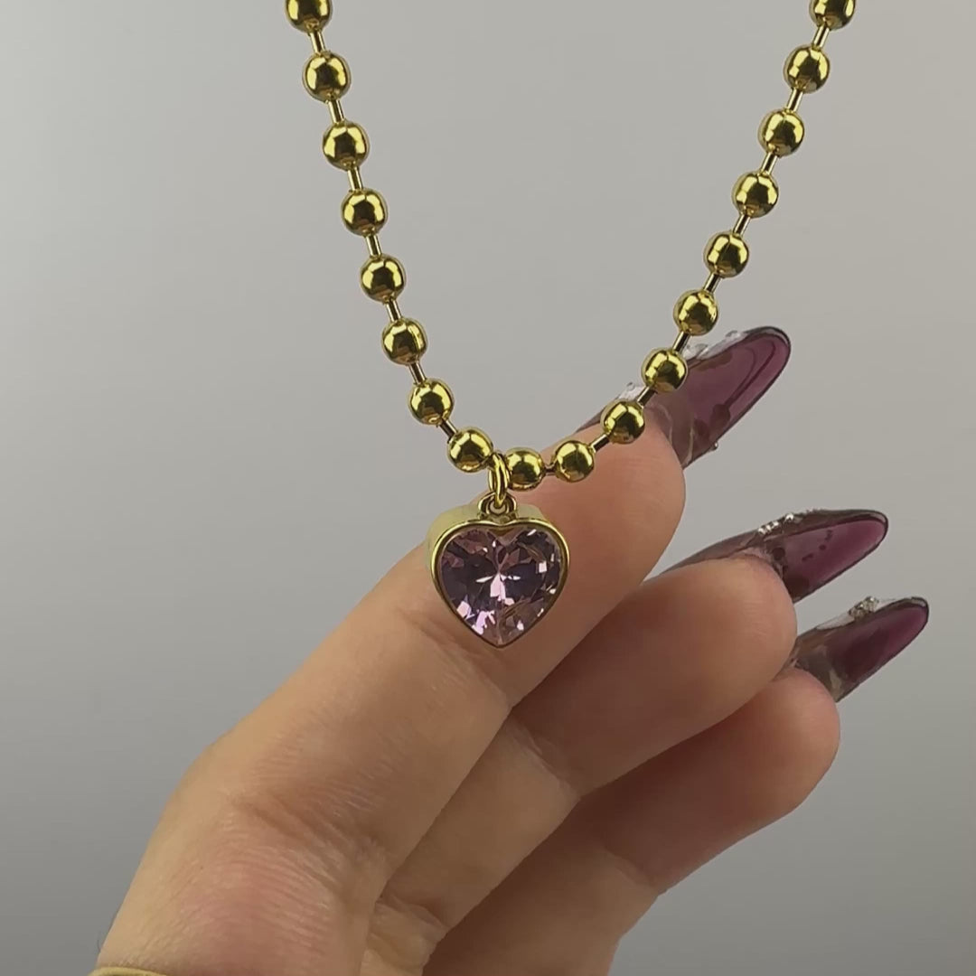 light pink heart shaped necklace