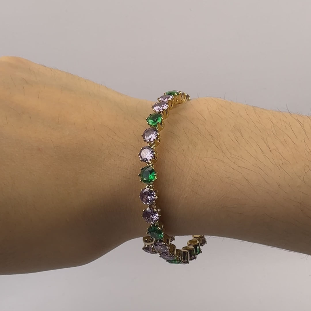 bracelet with light purple and green gemstone