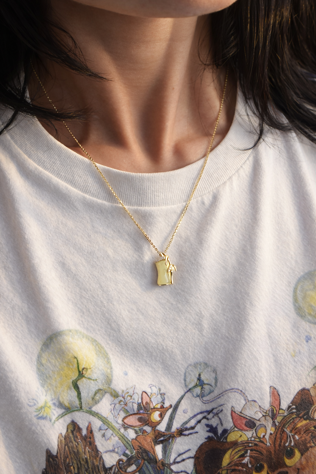 person wearing Prosperity gold plated sterling silver jade necklace 