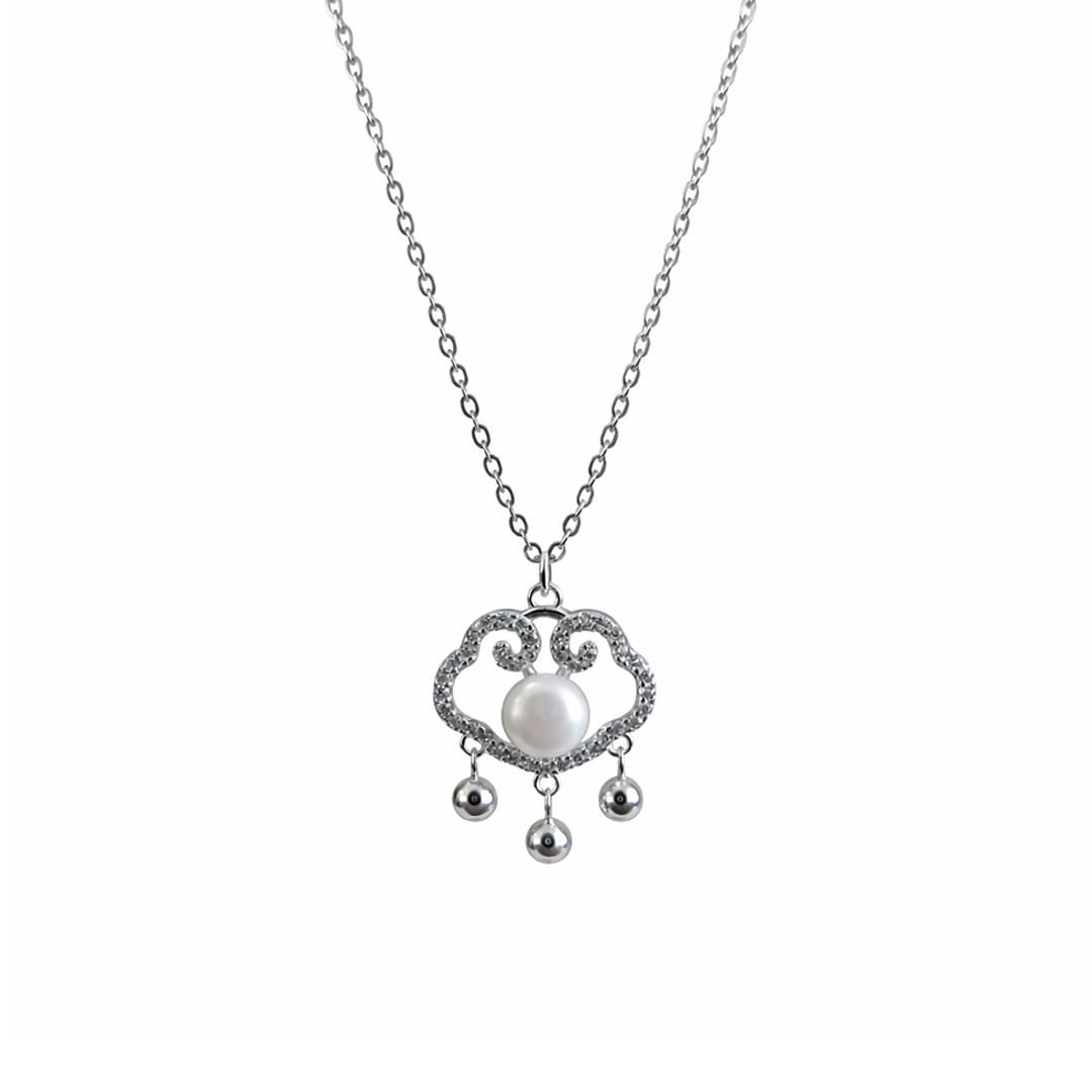 sterling silver necklace with pendant and a pearl on the center