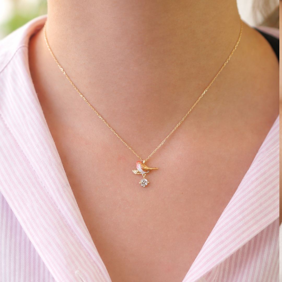 Gold plated sterling silver necklace with a delicate pendant 