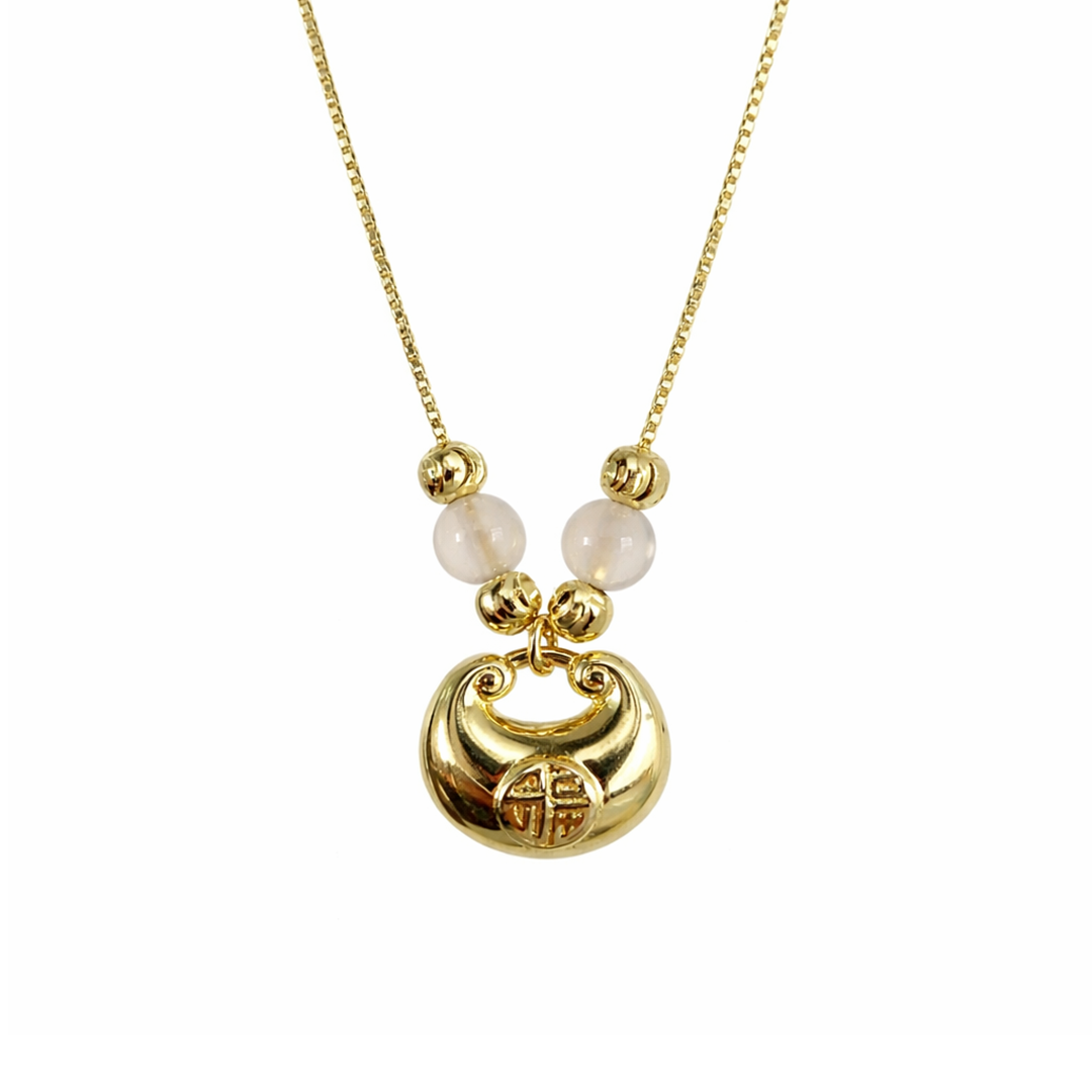 Gold plated necklace with a circular pendant and white beads